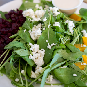 Arugula, beets, oranges, fresh goat cheese, and white balsamic vinaigrette dressing. **contains dairy**