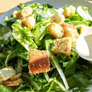 Romaine mix, crouton, pecorino romano cheese, and Caesar dressing. **contains raw egg, fish, wheat, egg, dairy, soy**